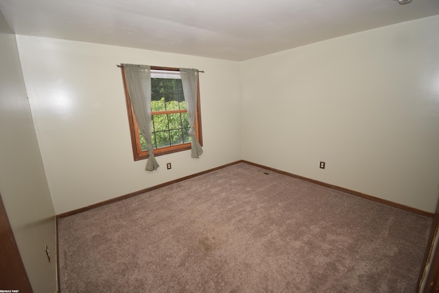 71800 Coon Creek Rd, Armada, MI 48005 - carpeted spare room featuring baseboards