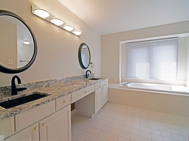 20343 Nicol Creek Dr, Macomb Twp, MI 48044 - full bath with tile patterned floors, double vanity, and a garden tub