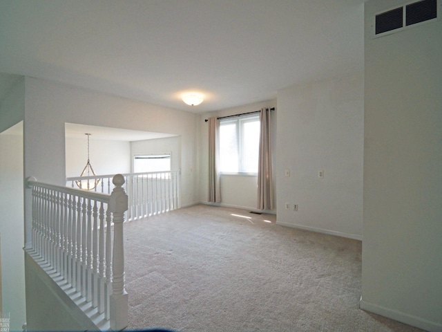 20343 Nicol Creek Dr, Macomb Twp, MI 48044 - carpeted empty room featuring baseboards and a heating unit