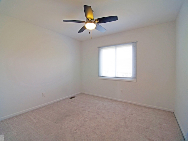 20343 Nicol Creek Dr, Macomb Twp, MI 48044 - empty room featuring light carpet and a ceiling fan