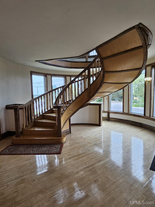 52377 Duncan Ave, Hubbell, MI 49934 - stairs with healthy amount of natural light and hardwood / wood-style flooring