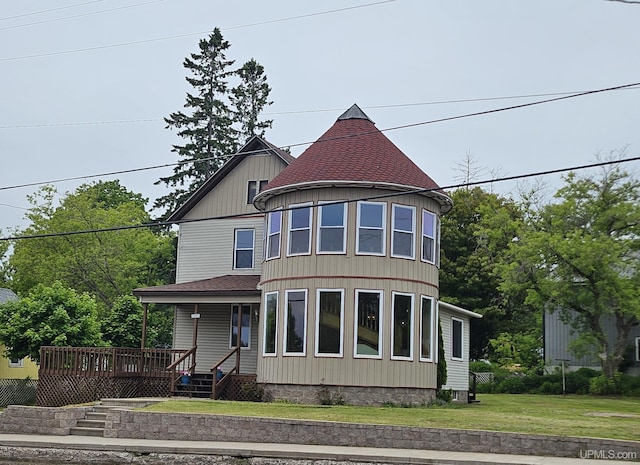 52377 Duncan Ave, Hubbell, MI 49934 - victorian house with a front yard and roof with shingles