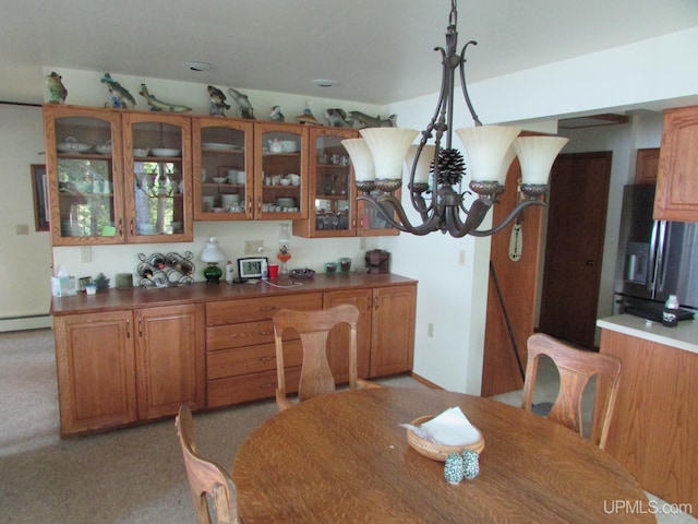 20517 Park Rd, Skanee, MI 49962 - dining room with baseboard heating and light colored carpet