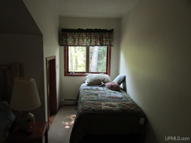 20517 Park Rd, Skanee, MI 49962 - bedroom with a baseboard radiator and light carpet