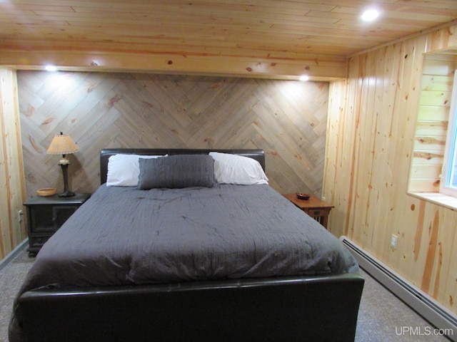 20517 Park Rd, Skanee, MI 49962 - bedroom with a baseboard radiator, wood ceiling, wood walls, and carpet flooring