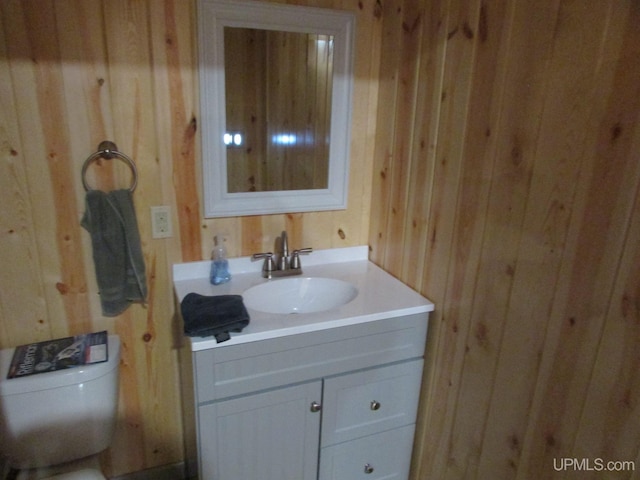 20517 Park Rd, Skanee, MI 49962 - bathroom with wooden walls and vanity