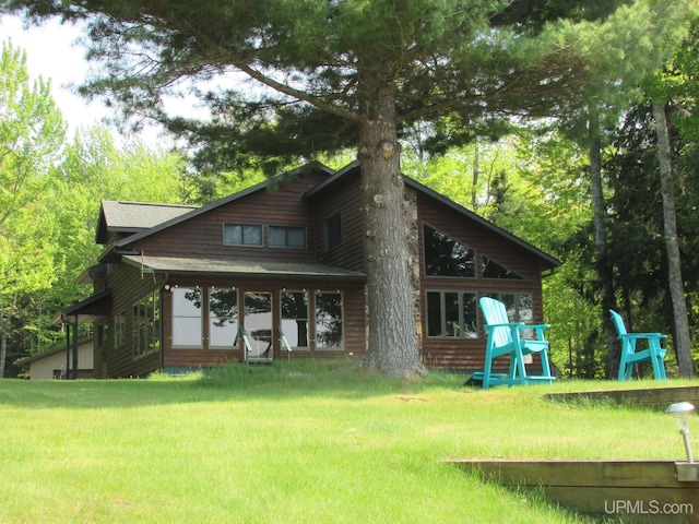 20517 Park Rd, Skanee, MI 49962 - rear view of house featuring a lawn