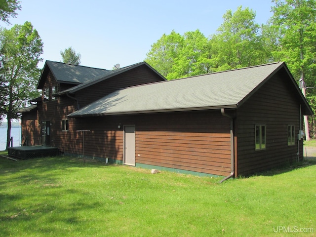 20517 Park Rd, Skanee, MI 49962 - view of home's exterior featuring a lawn
