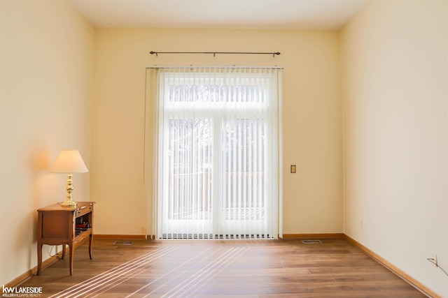 54826 Cambridge Dr, Shelby, MI 48315 - spare room featuring wood finished floors