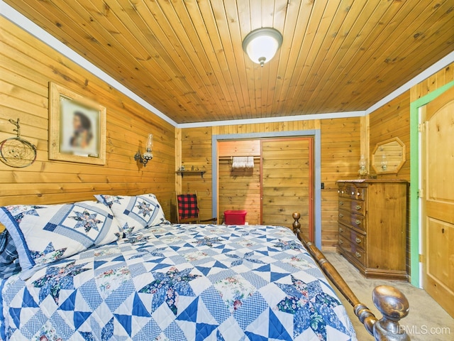 10031 N Ross Lake Rd, Shingleton, MI 49884 - bedroom featuring wooden walls, wood ceiling, a closet, and carpet