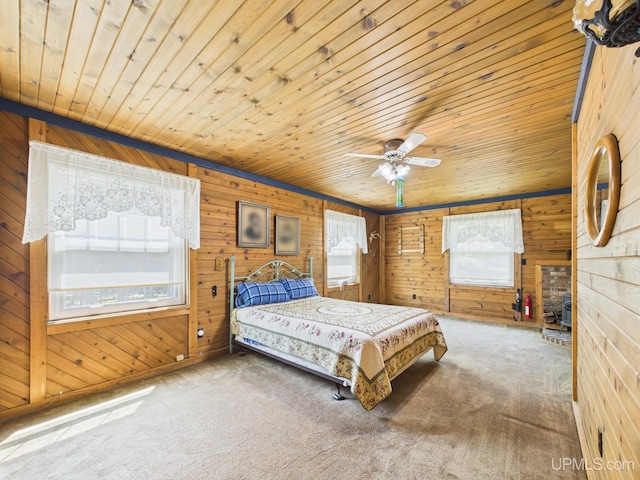 10031 N Ross Lake Rd, Shingleton, MI 49884 - bedroom with multiple windows, wooden walls, wooden ceiling, and carpet