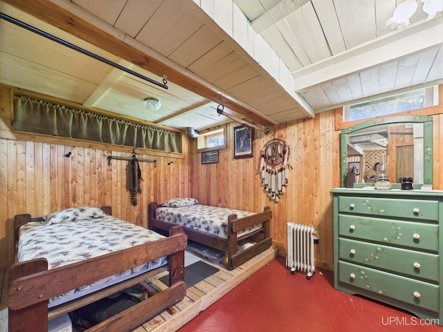 10031 N Ross Lake Rd, Shingleton, MI 49884 - bedroom featuring radiator heating unit, wood walls, and wood ceiling