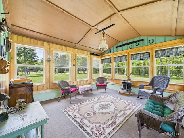 10031 N Ross Lake Rd, Shingleton, MI 49884 - sunroom / solarium with vaulted ceiling, carpet flooring, wood walls, and wooden ceiling