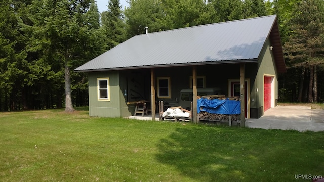 10031 N Ross Lake Rd, Shingleton, MI 49884 - view of outbuilding featuring driveway