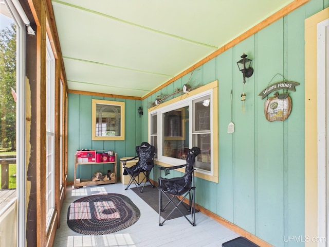 10031 N Ross Lake Rd, Shingleton, MI 49884 - sunroom featuring wood finished floors