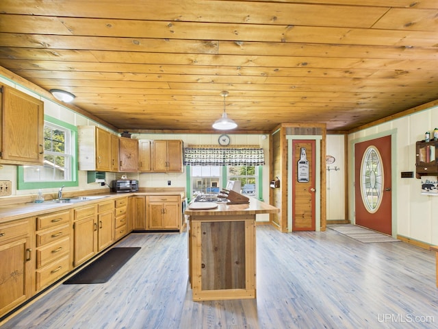 10031 N Ross Lake Rd, Shingleton, MI 49884 - kitchen featuring wood ceiling, a kitchen island, light wood-type flooring, and decorative light fixtures