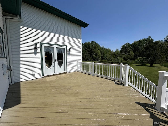 232 Winberg Rd, Skandia, MI 49885 - deck featuring a lawn