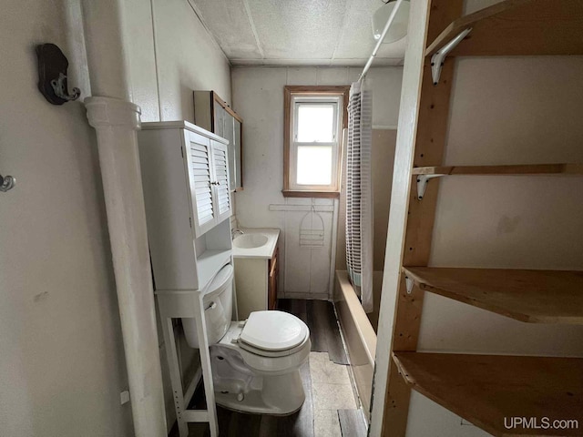 228 Schoolcraft Ave, Manistique, MI 49854 - bathroom featuring shower / bath combo and vanity