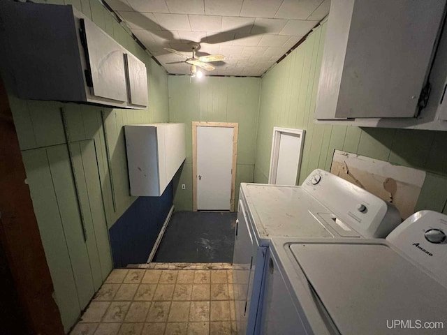 228 Schoolcraft Ave, Manistique, MI 49854 - laundry area featuring washing machine and clothes dryer, cabinet space, and a ceiling fan