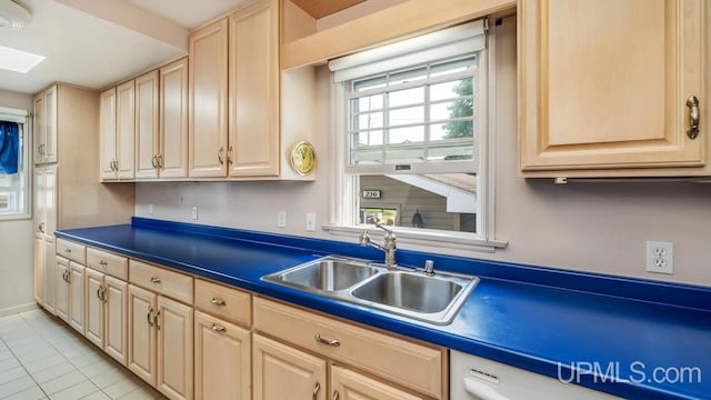 216 Mine St, Norway, MI 49870 - kitchen featuring light brown cabinets, light tile patterned floors, and dark countertops