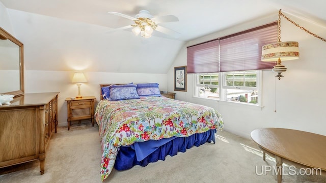 216 Mine St, Norway, MI 49870 - bedroom with carpet, vaulted ceiling, and a ceiling fan