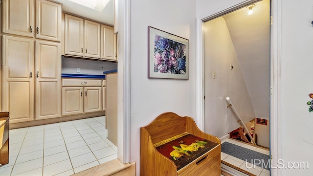 216 Mine St, Norway, MI 49870 - kitchen featuring light tile patterned flooring and cream cabinets