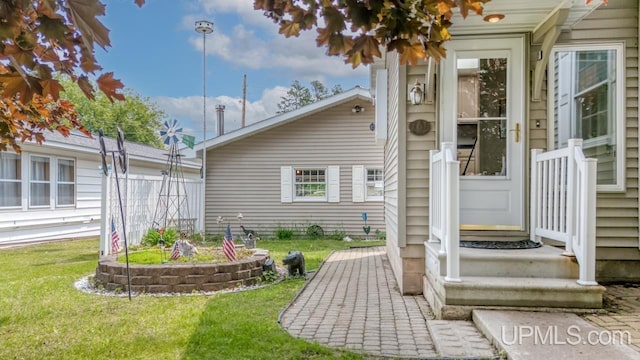 216 Mine St, Norway, MI 49870 - property entrance featuring a lawn