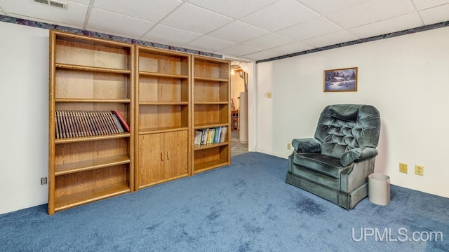 216 Mine St, Norway, MI 49870 - living area featuring carpet floors and a drop ceiling