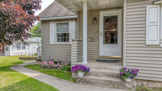 216 Mine St, Norway, MI 49870 - property entrance with a lawn