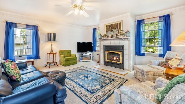 216 Mine St, Norway, MI 49870 - living area with healthy amount of natural light, a fireplace, ceiling fan, and carpet floors