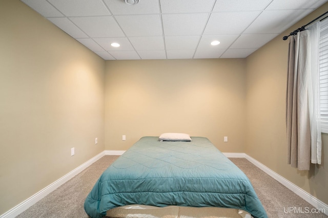 821 Camelot Dr, Negaunee, MI 49866 - carpeted bedroom featuring a paneled ceiling and recessed lighting