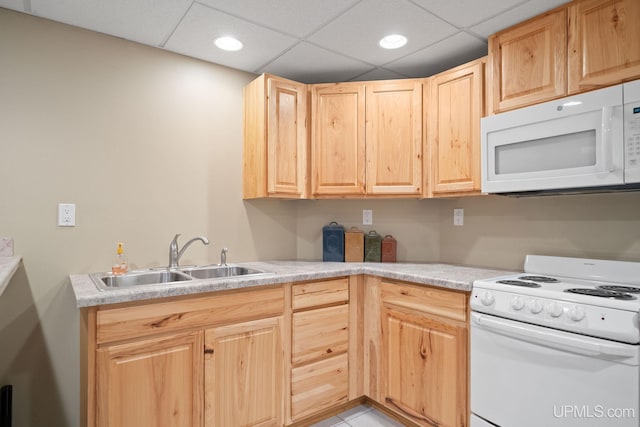 821 Camelot Dr, Negaunee, MI 49866 - kitchen featuring white appliances, light brown cabinetry, light countertops, and recessed lighting