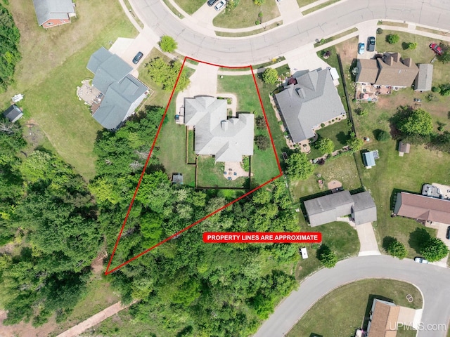 821 Camelot Dr, Negaunee, MI 49866 - aerial view of residential area with property boundaries highlighted