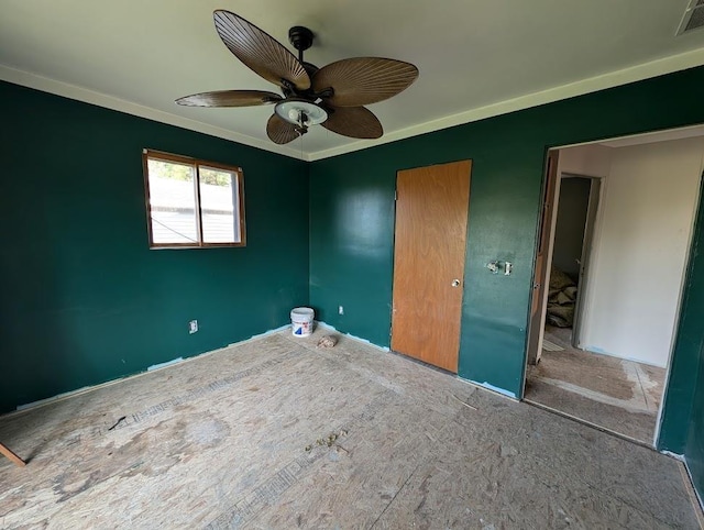 304 Beech St, Kawkawlin, MI 48706 - unfurnished bedroom with crown molding, a closet, and a ceiling fan