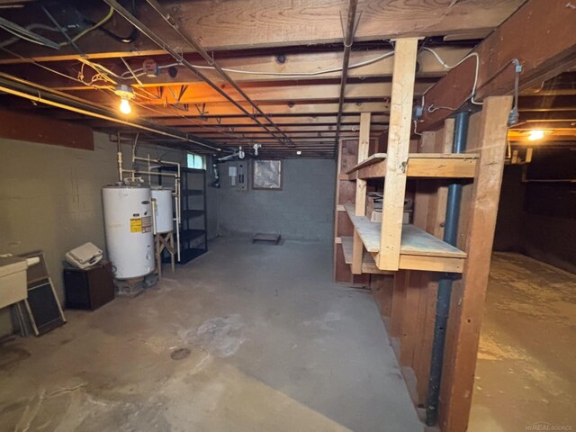 10301 County Farm Rd, Parma, MI 49269 - unfinished below grade area featuring water heater and gas water heater