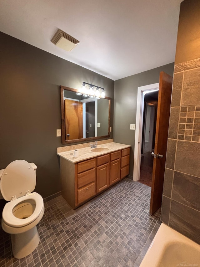 10301 County Farm Rd, Parma, MI 49269 - bathroom with vanity and a tub