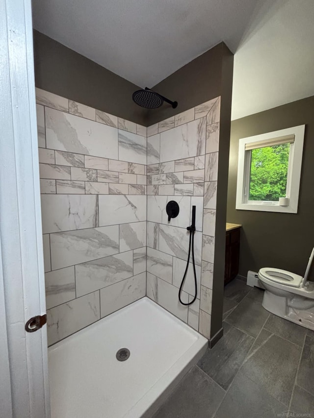 10301 County Farm Rd, Parma, MI 49269 - bathroom with a tile shower and vanity
