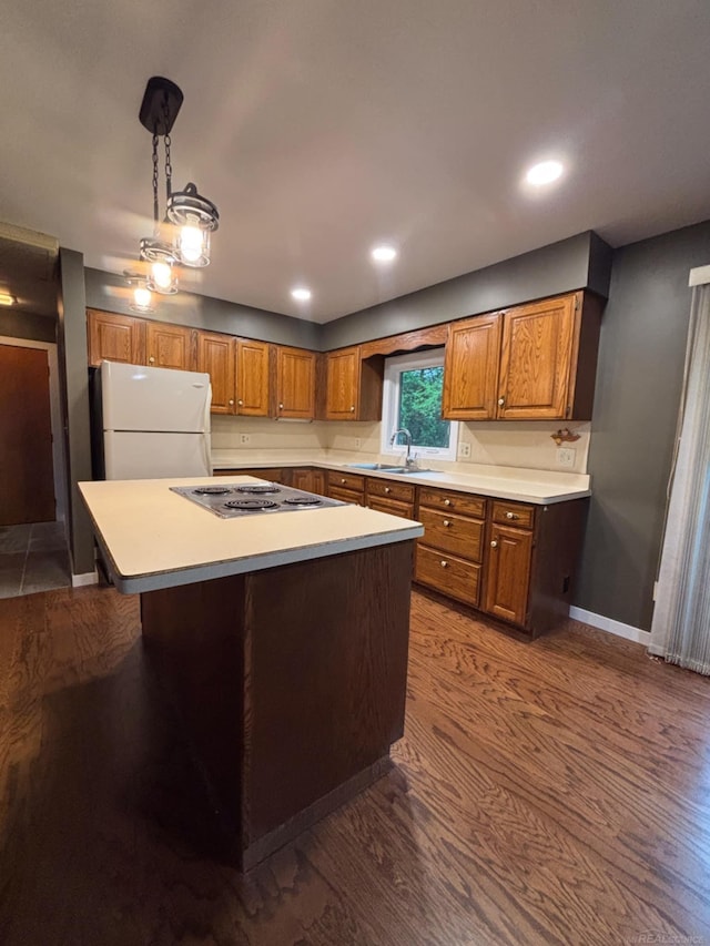 10301 County Farm Rd, Parma, MI 49269 - kitchen featuring freestanding refrigerator, wood finished floors, electric cooktop, light countertops, and recessed lighting
