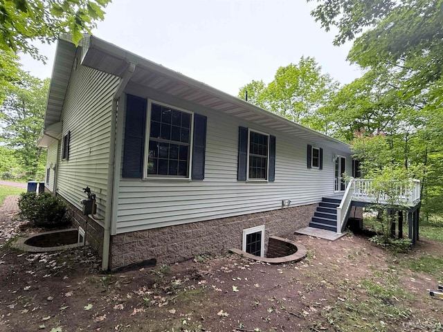 2003 Spruce Ln, Houghton, MI 49931 - view of side of property featuring stairs and a deck