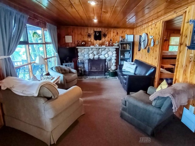 801 W Rd, Harrison, MI 48625 - carpeted living area with wooden ceiling, wood walls, and a stone fireplace