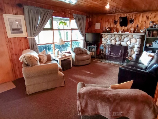 801 W Rd, Harrison, MI 48625 - carpeted living room with wood ceiling, wood walls, and a stone fireplace