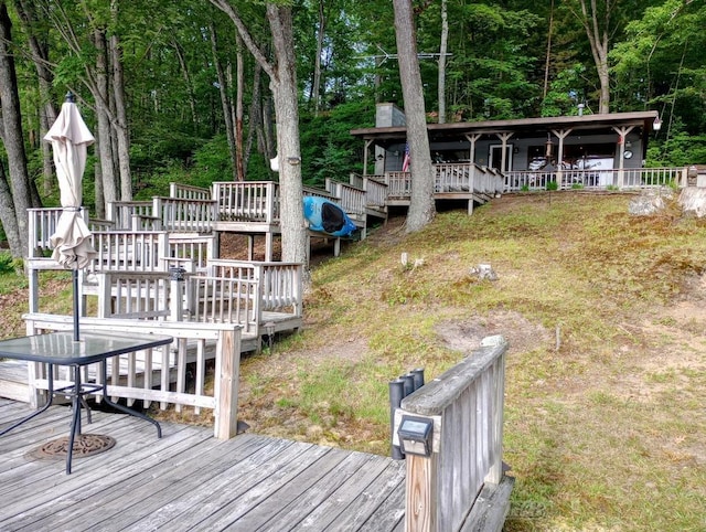 801 W Rd, Harrison, MI 48625 - wooden deck with a wooded view and stairway