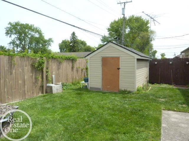 20127 14 Mile Rd, Clinton Township, MI 48035 - view of shed featuring a fenced backyard