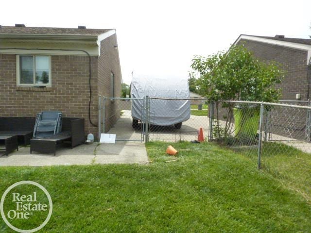20127 14 Mile Rd, Clinton Township, MI 48035 - view of yard with a gate