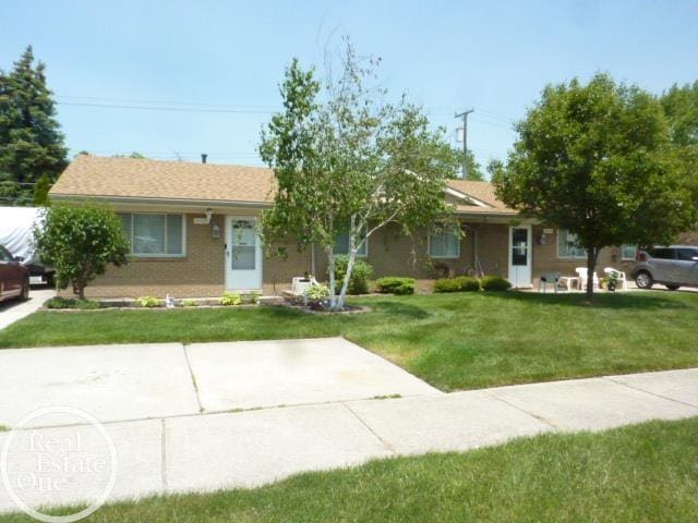 20127 14 Mile Rd, Clinton Township, MI 48035 - ranch-style home featuring a front yard