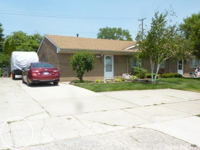 20127 14 Mile Rd, Clinton Township, MI 48035 - single story home featuring driveway and a front lawn