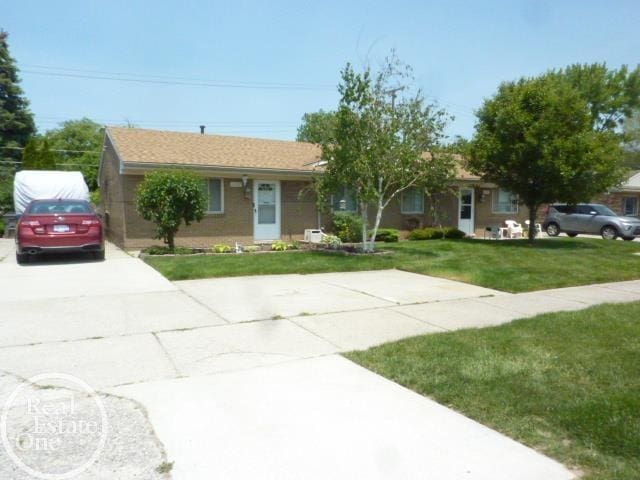 20127 14 Mile Rd, Clinton Township, MI 48035 - single story home featuring concrete driveway and a front yard