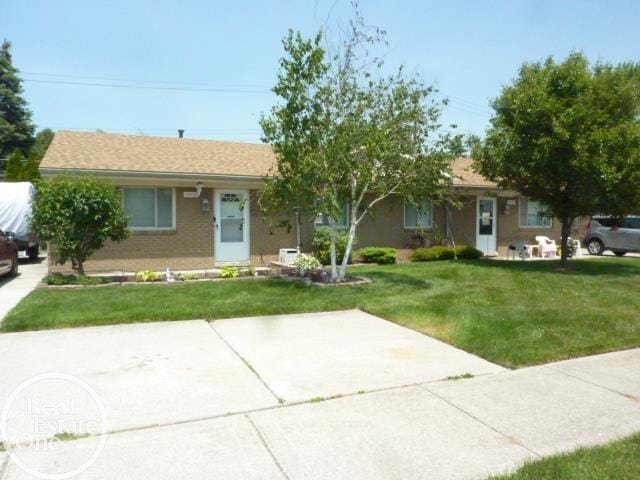 20127 14 Mile Rd, Clinton Township, MI 48035 - single story home featuring a front lawn
