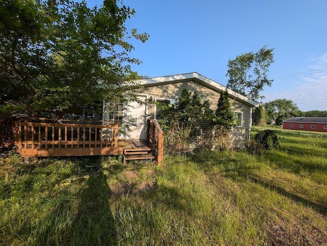 2920 Lauria Rd, Kawkawlin, MI 48706 - rear view of property featuring a deck