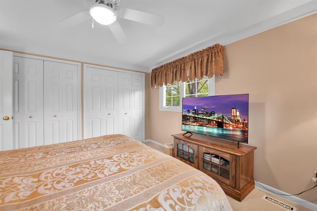 4112 Adams Dr, Shelby Twp, MI 48316 - bedroom with multiple closets and ceiling fan